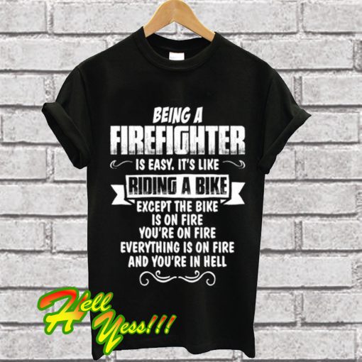 Being A Firefighter riding a bike T Shirt